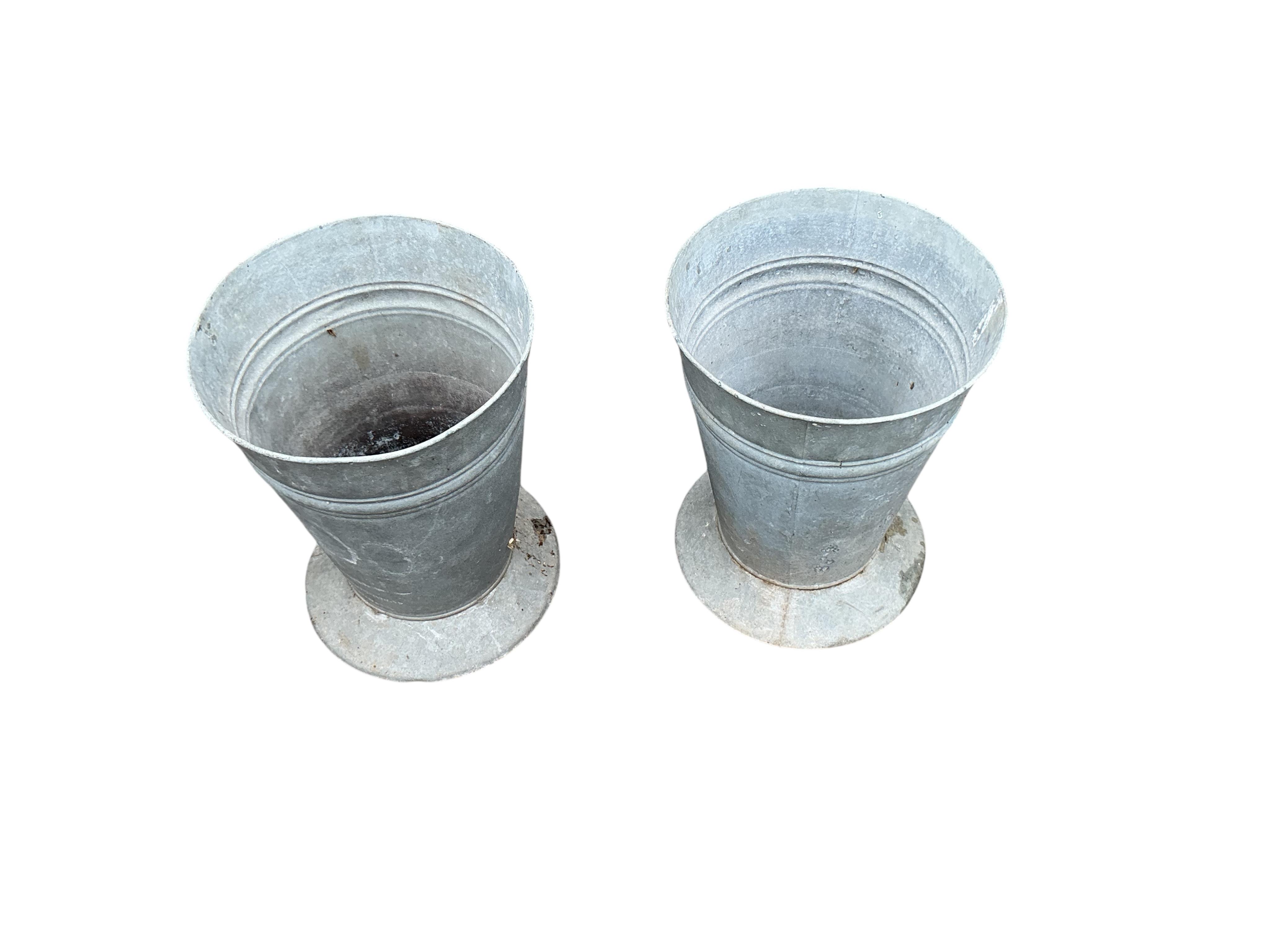 A pair of galvanised florist's flower buckets, diameter 29cm, height 38cm